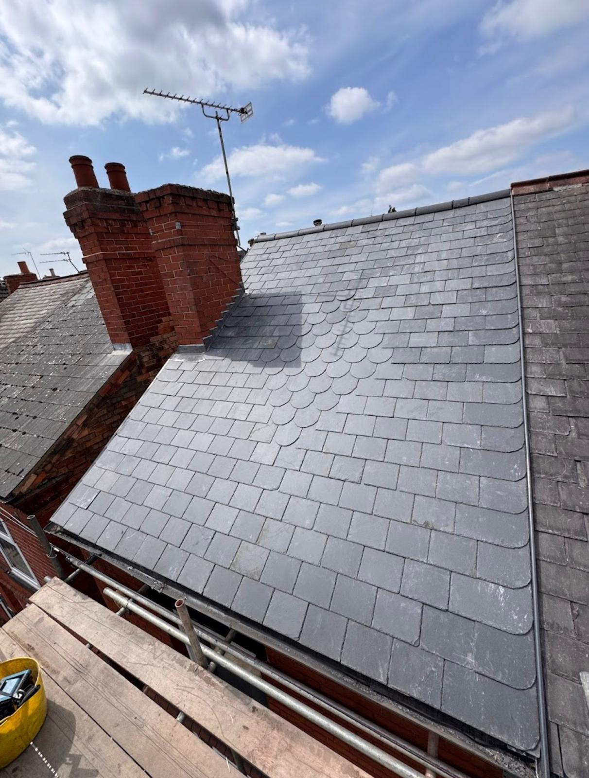 Slate roof with decorative detail by BMN Roofing, Derbyshire