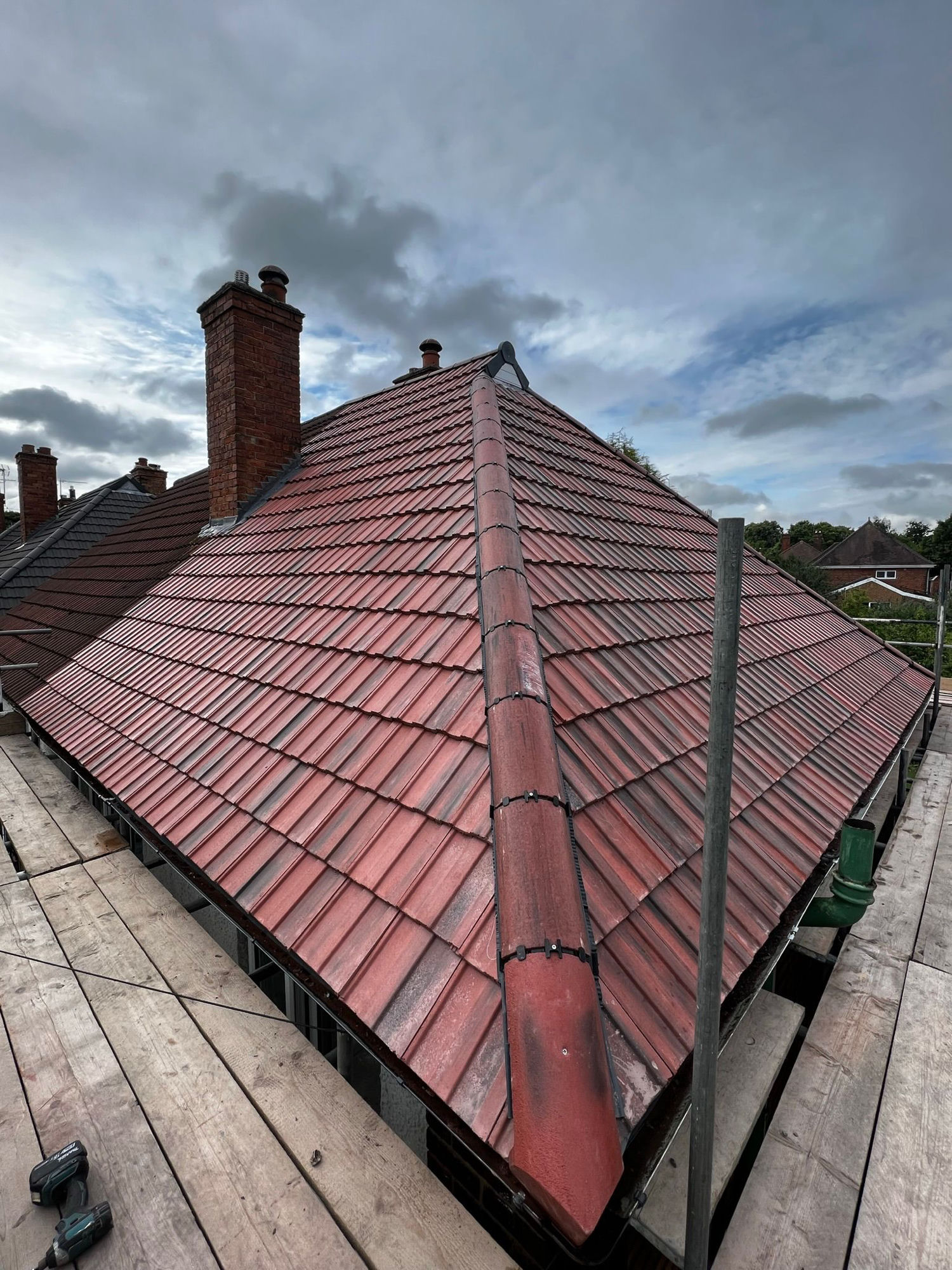 Hip roof tile installation by BMN Roofing, Derbyshire
